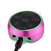 The Critical Atom X Power Supply in Pink lit up in green with the power cord attached for use. 