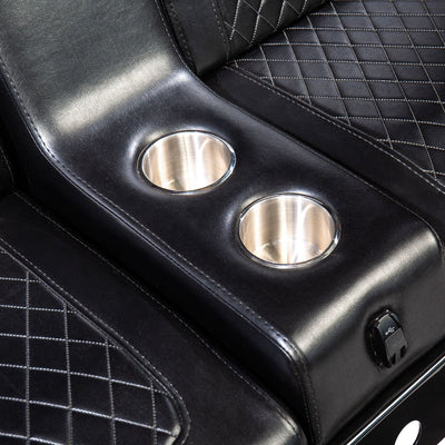 A close-up view of the built-in metal cup holders in the center of the Comfort Before Pain Waiting Room Bench in black vinyl. 