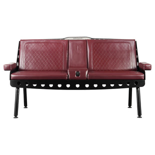 A front view of an Ox Blood Comfort Before Pain Waiting Room Bench with quilted vinyl seating and built-in cup holders. 